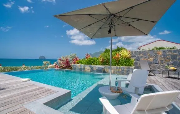 Villa de Luxe Diamond Rock avec piscine, accès direct à la mer